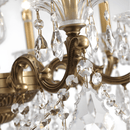 Detail of Shine chandelier with bronze scrollwork and precision-cut Asfour crystals.