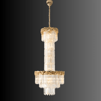Luxury crystal chandelier for foyer or villa entrance with 18K gold plated frame and tiered crystals.
