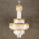 La Scala Crystal Sovrano chandelier with 18K gold-plated copper and crystal tiers on grey background.