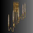 Angled view of Luce di Roma Foro gold wall sconce with sculptural arms and champagne Asfour crystal spears.