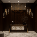 Luce di Roma Foro wall sconce installed in an elegant hallway with marble flooring, radiating warm champagne illumination.