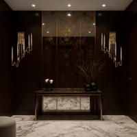 Luce di Roma Foro wall sconce installed in an elegant hallway with marble flooring, radiating warm champagne illumination.