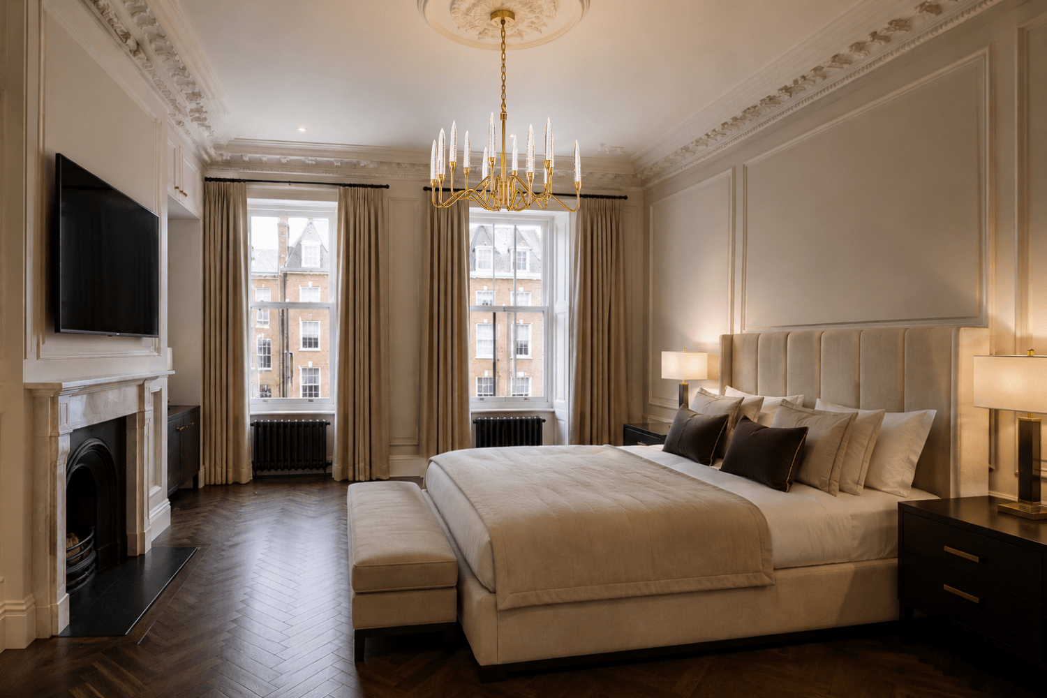 Luce di Roma Theia luxury gold chandelier installed in a modern Chelsea bedroom with elegant interior