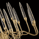 Close-up view of Hestia’s champagne crystal spires and gold-plated arms, showing intricate craftsmanship.