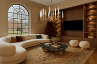 Hestia chandelier installed in a luxury living room, showcasing warm LED glow, gold structure, and champagne crystals.