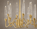 Close-up of Luce di Roma Vesta luxury linear chandelier in 18K gold with champagne crystal LED lighting