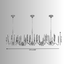 Technical diagram of the Luce di Roma Vesta chandelier showing full 218 cm length, height, structure, and 35-arm crystal.