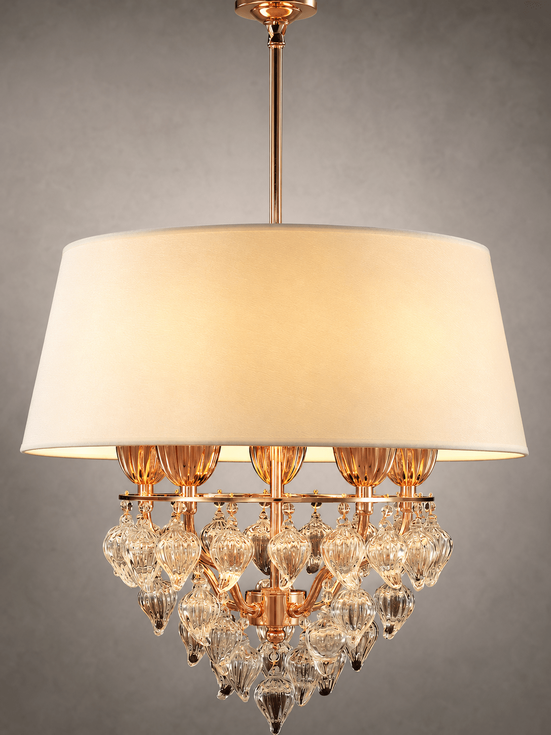 Close-up of Luce Regale Avorio pendant with ivory shade, gold metalwork and crystal drops.