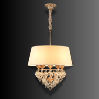 Luce Regale Avorio five-light pendant with ivory shade, gold frame and cascading crystal drops.