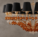 Close-up of Luce Regale Donatello Imperiale chandelier with amber Murano-style glass and 18K gold finish