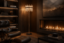 Manhattan Column crystal floor lamp in a dark luxury study beside a leather chair and modern fireplace.