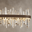 Close-up of Manhattan Linear Crystal Chandelier with clear crystals and brown leather band.
