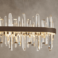 Close-up of Manhattan Linear Crystal Chandelier with clear crystals and brown leather band.