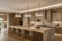 Three Manhattan Orbit Crystal Chandeliers above a marble kitchen island in a luxury Texas residence.