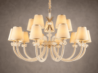 Close up of the Maria Grandeur 15-light chandelier with ivory shades and crystal-wrapped arms shown on a light grey background.