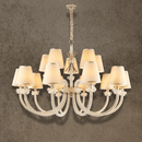 Luxury 15-light Maria Grandeur chandelier with ivory shades, Asfour crystal arms and 18K gold-plated copper, front view.