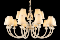 Hero image of the Maria Grandeur 15-light chandelier with ivory shades and crystal-wrapped arms shown on a black background.