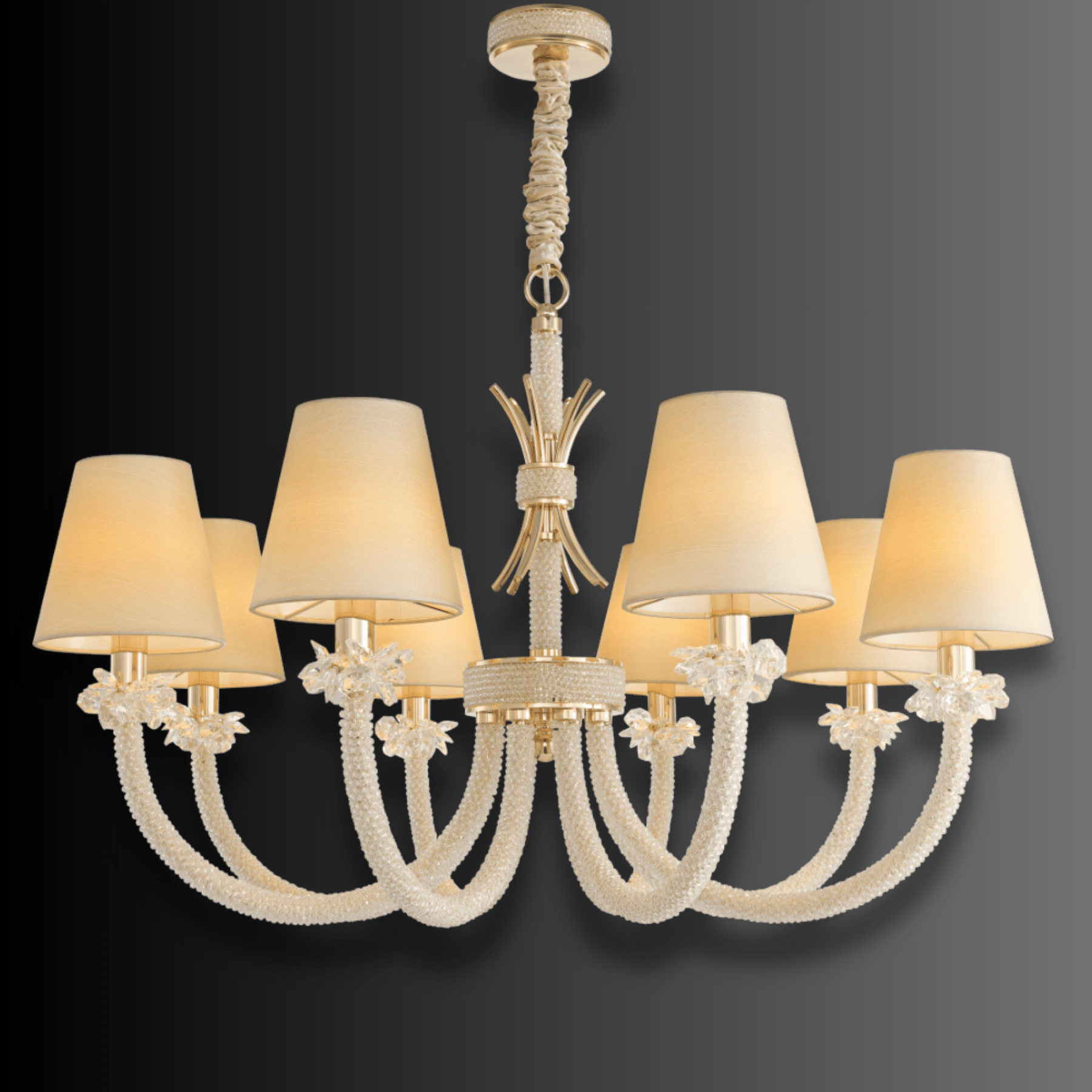 Maria Luxe chandelier on a dark gradient background, featuring 8 ivory shades, crystal-wrapped arms, gold detailing.