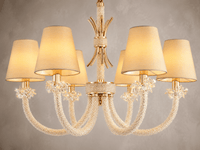 Close up shot of the Maria Petite Eclat showing the crystal, gold and fabric details against a light grey background.