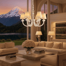 Maria Petite Éclat chandelier in a luxury living room with mountain views, radiating soft warm light.