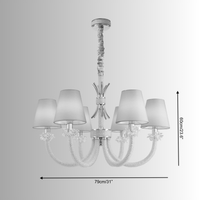 Size diagram of the Maria Petite Éclat chandelier showing 79 cm diameter and 60 cm height with crystal, ivory fabric shades.