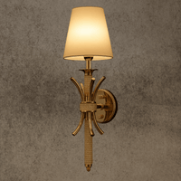Maria Sconce Élan 18K gold-plated wall light with ivory fabric shade and Asfour crystal detailing shown on grey background.
