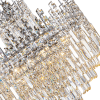 Close-up detail of Maurice Argent chandelier showcasing precision-cut Asfour Egyptian crystals and polished stainless steel.