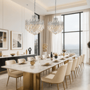 Maurice Argent crystal chandelier installed above a luxury dining table in a contemporary dining room interior.