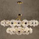 Modernus Halo chandelier with layered Murano-style glass discs and gold frame for luxury interiors.