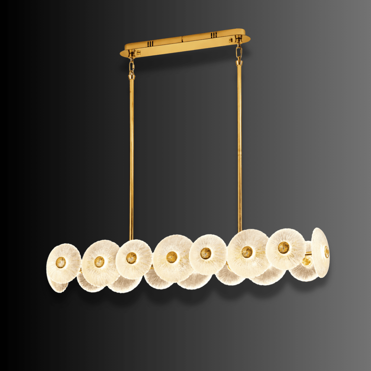 Modernus Linear chandelier by HDLS Lighting on a dark background, showcasing sculpted Murano-style glass discs and brass-gold.