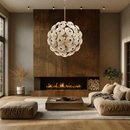 Modernus Moon chandelier illuminating a contemporary living room, showcasing its radiant glass disc sphere.
