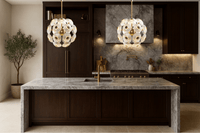 Modernus Moon chandelier illuminating a luxury kitchen interior, adding sculptural elegance.