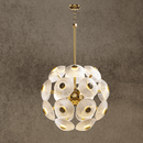 Small Modernus Moon chandelier featuring sculpted glass discs forming a glowing sphere with brass-gold.