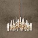 Montclair Crystal Chandelier displayed against a textured wall, emphasizing its circular silhouette and warm crystal glow.