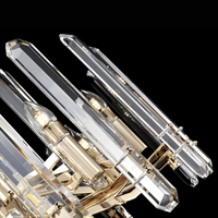 Close-up of K9 crystal prisms and 18K gold-plated copper body on the Montclair Crystal Chandelier, showing material detail.