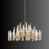 Studio image of the Montclair Crystal Chandelier with illuminated K9 crystal prisms and 18K gold-plated copper structure.