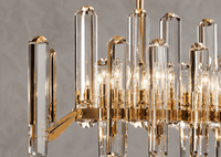 Close-up of Montclair Galerie crystal linear chandelier with gold finish and premium faceted crystal