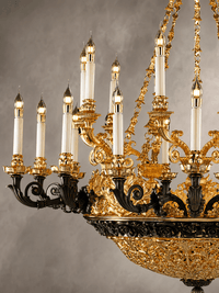 Close-up of Opéra Noir Majesté chandelier showing matte-black copper and 24K gold-plated detailing.
