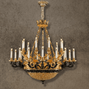 Opéra Noir Majesté black and gold French chandelier in 24K gold-plated copper on a neutral background.