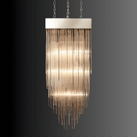 Side view of Petra Argent rectangular chandelier with cascading vertical glass rods and warm layered illumination