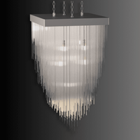 Angled view of Petra Argent Square chandelier with layered glass rods and refined silver finish for contemporary interiors