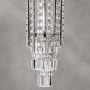 Close-up of Plaza Crown Column Crystal Chandelier with polished chrome and precision-cut crystal details