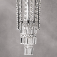 Close-up of Plaza Crown Column Crystal Chandelier with polished chrome and precision-cut crystal details
