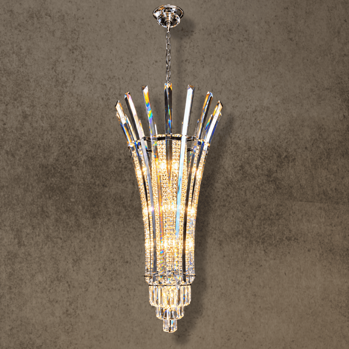 Plaza Crown Prism tall column crystal chandelier with solid crystal blades and chrome frame, front view.