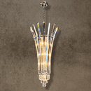 Plaza Crown Prism tall column crystal chandelier with solid crystal blades and chrome frame, front view.