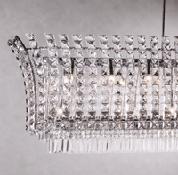 Close-up of Plaza Crystal Linear Grande Chandelier with premium crystal detailing and polished chrome finish