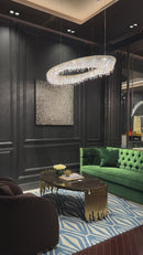 Aurelio Wave Oval crystal chandelier illuminated in a dark luxury interior with Asfour crystal and 18K gold finish.