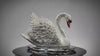 Video showing rotating VAGHAAR Swarovski crystal swan sculpture on crystal tray base.