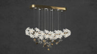 Video preview of Magnolia Grazia chandelier showing floating magnolia blooms and gold accents.