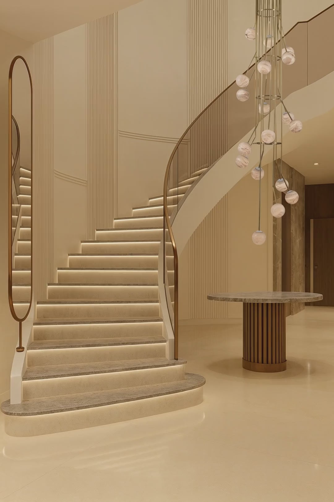 a short video of alabaster stella chandelier installed in staircase.